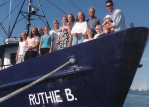 Blount Family on bow of Ruthie B 12.13.2005